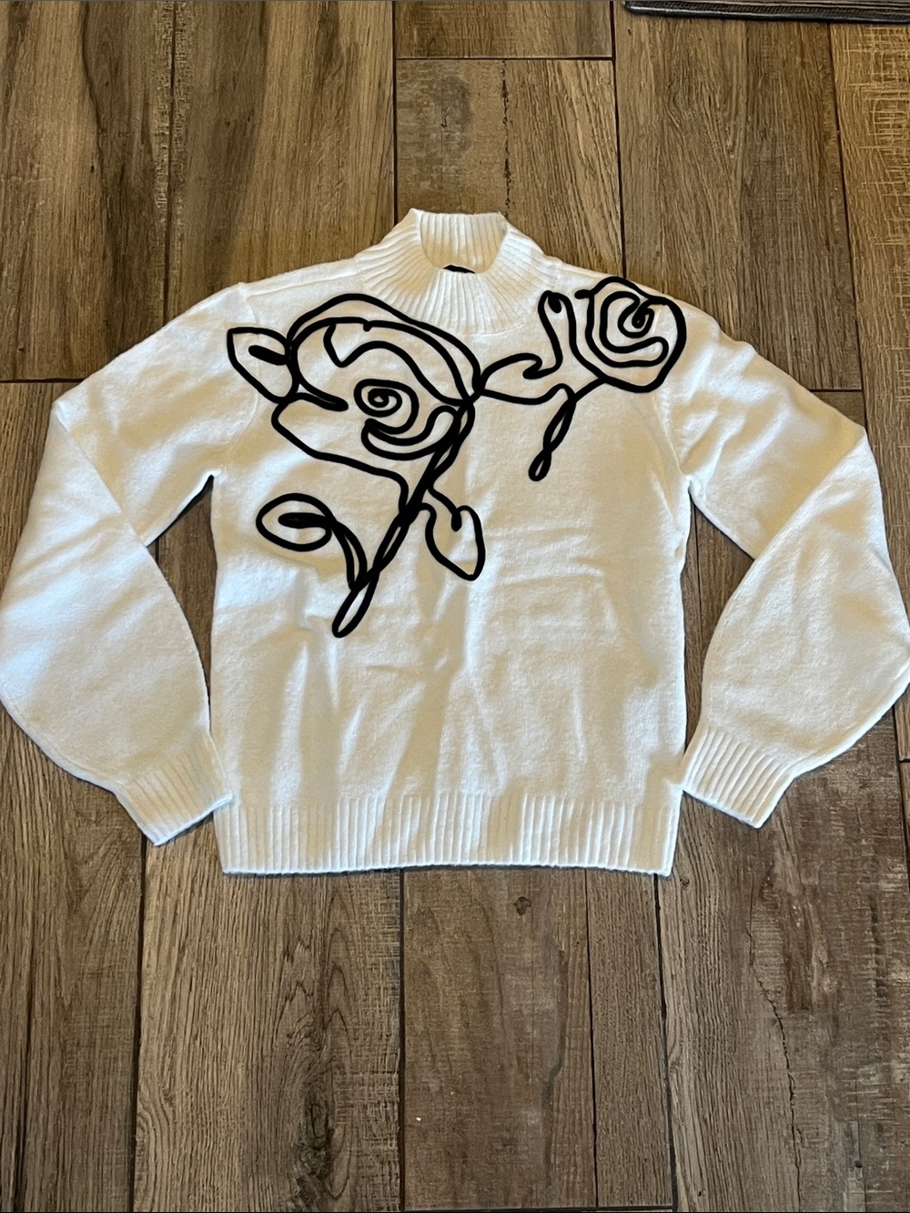White House Black Market Cream Mock-Neck Sweater with Black Abstract Rose Motif